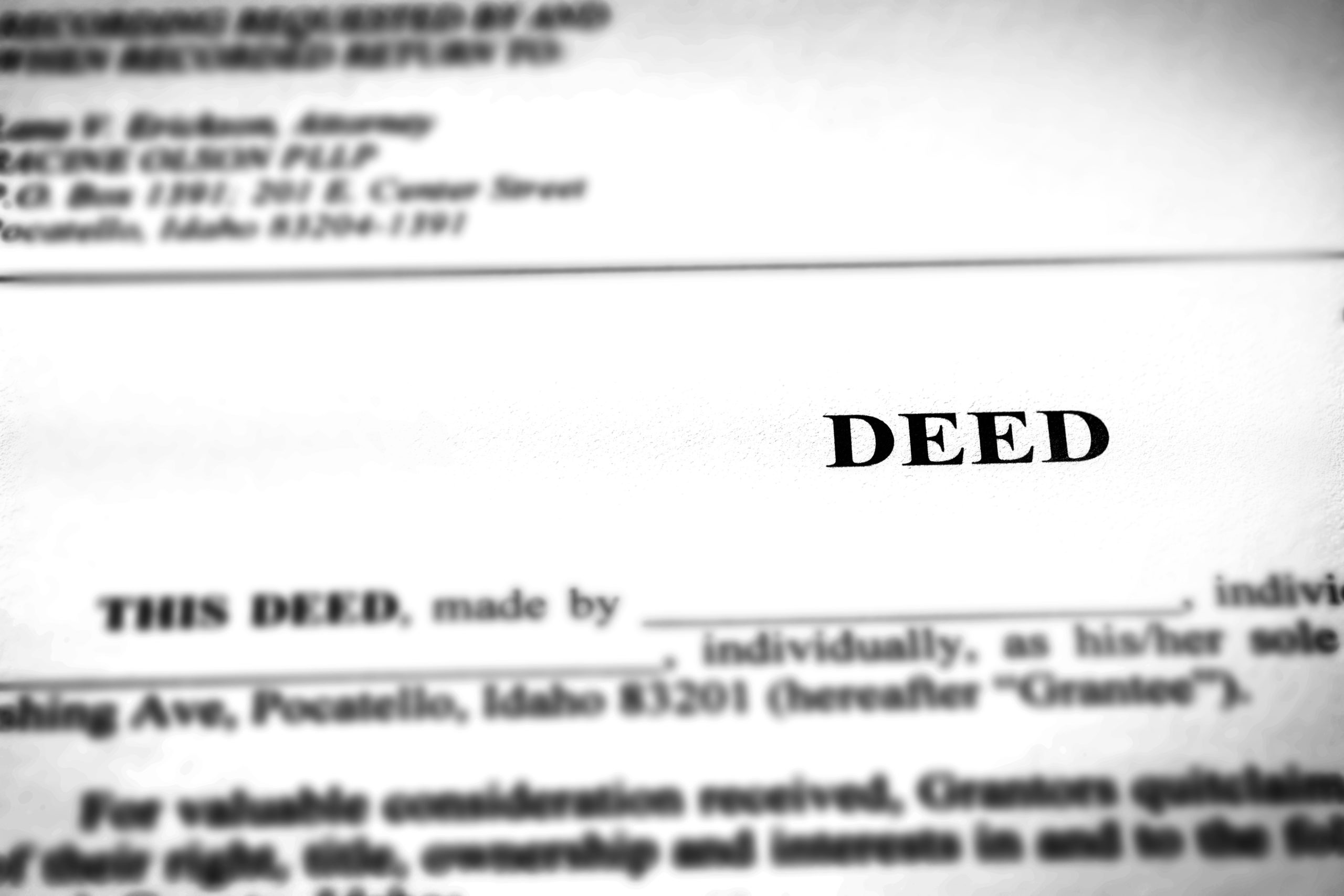 Deed to real estate transfer title ownership to land or home