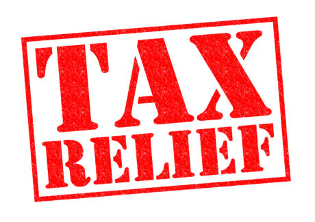TAX RELIEF red Rubber Stamp over a white background.