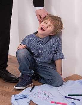 Dad punished son by grabbing ear