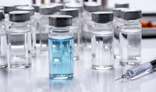 Several vials with medication, conceptual image