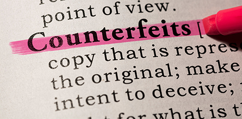 Highlighted dictionary entry of the word "counterfeits"