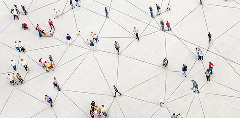Various people in a courtyard connected by lines