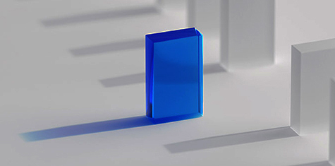 Blue plastic rectangle in front of group of clear plastic rectangles