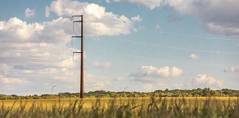 View of sky and landscape with power lines