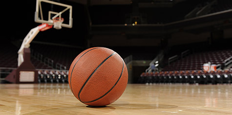 Close up of basketball on court floor